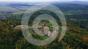 Srebrna Gora fortress and Sudety mountains at autumn season, aerial drone view