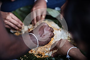 Sri Lanka: family members eating with their hands