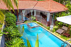 Nice villa at tropical hotel. Idyllic scenic courtyard with swimming pool