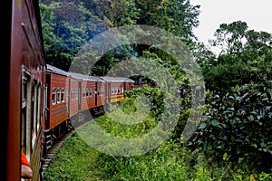 Sri Lanka\'s Colombo Fort main train station to Badulla station travels through dense forest