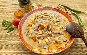 Sri Lankan traditional Style coconut milk prawn curry photo