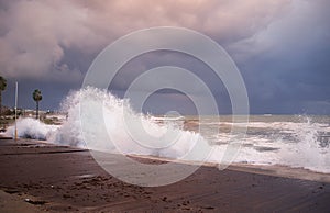 Sstorm clouds with waves on the coast