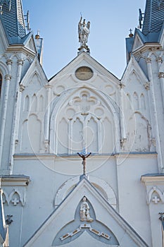 St. Anna Roman Catholic Church detail with Michael archangel statue on roof and motto St. Anna Pray For Us