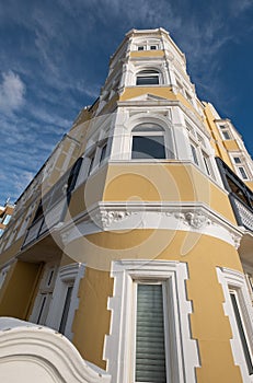 St Aubyns Mansions on Kings Esplanade. Restored mustard coloured block of flats overlooking the sea in Hove, East Sussex UK. photo