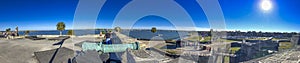 ST AUGUSTINE, FL - FEBRUARY 2016: Tourists along St Marcos Castle on a sunny winter day - Panoramic view