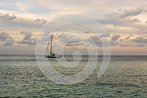 St. Barthâ€™s Island St. Bartâ€™s Island, Caribbean. Sailing boat with a beautiful sky in background in St. Barthâ€™s Bay