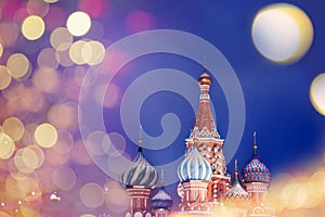 St. Basil Cathedral on Red Square in Moscow, bokeh christmas light winter night