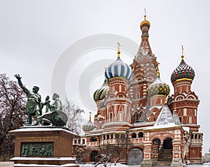 St. Basil`s cathedral and monument to Minin and Pozharsky on Red Square in Moscow, Russia, at winter