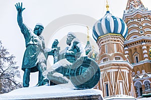 St Basil`s Cathedral and monument to Minin and Pozharsky in winter, Moscow, Russia