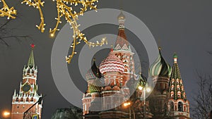 St. Basil`s Cathedral on Red Square against the backdrop of Christmas decorations.