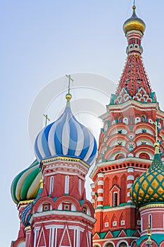 St Basil`s cathedral on Red Square in Moscow. Domes the cathedral lit by the sun.