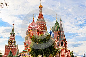 St. Basil`s Cathedral and Spasskaya tower of Kremlin on Red Square in Moscow, Russia