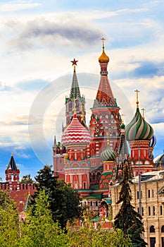 St. Basil`s Cathedral and Spasskaya tower of Kremlin on Red Square in Moscow, Russia