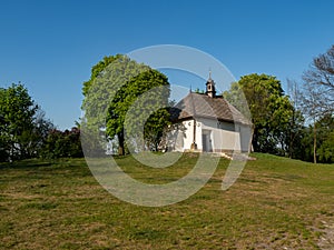 St Benedict`s Church on hill during late spring, sunny day.