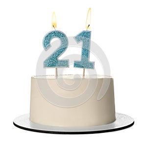 21st birthday. Delicious cake with number shaped candles for coming of age party isolated on white