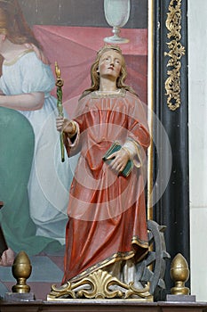 St. Catherine of Alexandria statue on the altar of St. Anne at the Church of the Holy Three Kings in Stara Ploscica, Croatia