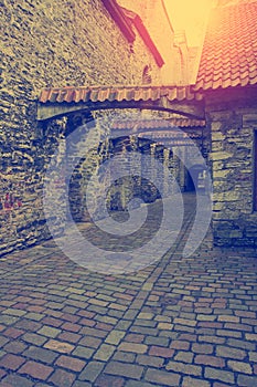 St. Catherine Passage - a little walkway in the old city Tallinn, Estonia. retro effect