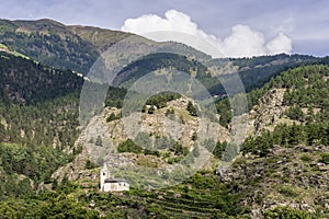 St. Egidius, a Roman Catholic church above the village of Kortsch in the municipality of Schlanders in South Tyrol, Italy photo