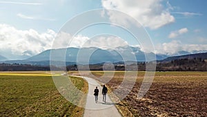 St Egyden - A couple walking around the fields