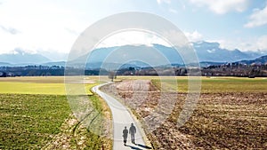 St Egyden - A couple walking around the fields