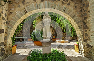St. Francis of Assisi statue in colonial garden