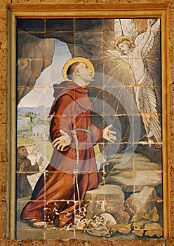 St. Francis invoking Jesus photo