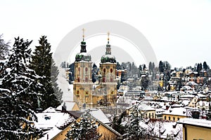 Covered in snow Cathedral in St Gallen, Switzerland photo