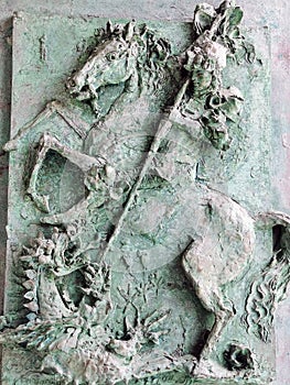 St. George and the Dragon on the door of Chiesa di San Giorgio church.