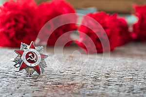 St. George ribbon and red carnation, may 9 Victory Day concept, symbol of the Second World war