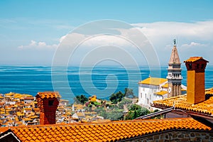 St. George`s Parish Church and old town and Adriatic sea panorama view in Piran, Slovenia