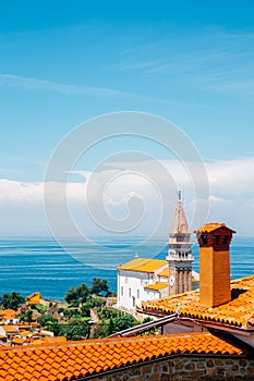 St. George`s Parish Church and old town and Adriatic sea panorama view in Piran, Slovenia