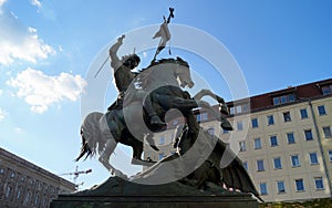 St George Slaying The Dragon, bronze sculpture, in historic Nikolaiviertel, Berlin, Germany