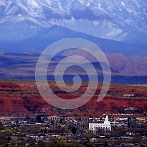 St. George Utah Valley with Mormon LDS Temple Red Cliffs and Snow Covered Mountains Miniature Blur