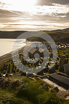 St. Hywyn\'s Church and the village of Aberdaron, Wales. Aberdaron is on the Llyn Peninsula in Gwynedd, North Wales