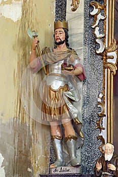 St. Isidore statue on the altar of the Holy Trinity at the Church of the Visitation in Gornji Draganec, Croatia