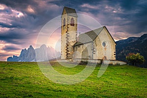 St Jakob church at sunrise in Funes valley, Dolomites, Italy