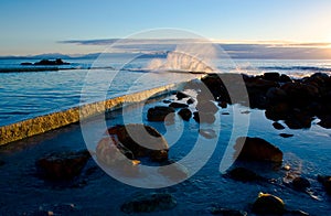 St. James - Dawn Splash Against Tidal Pool