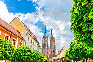 St. John the Baptist church building with two spires in old historical city centre, Ostrow Tumski, Wroclaw