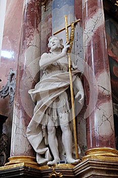 St John the Baptist statue on the altar in Benedictine monastery church in Amorbach, Germany