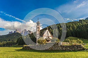 St. John church in front of the Odle mountains, Funes Valley, Dolomites, Italy