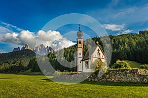 St. John church in front of the Odle mountains, Funes Valley, Dolomites, Italy