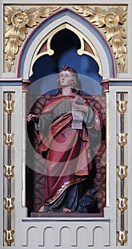 St. John the Evangelist statue on the pulpit in the church of Saint Matthew in Stitar, Croatia