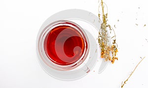 St. John`s wort tea on white background
