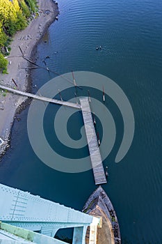 St Johns Bridge support and small floating pier on Willamette ri