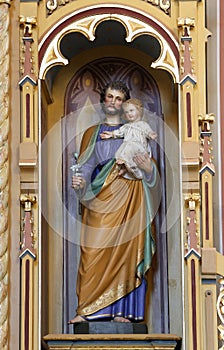 St. Joseph holding baby Jesus