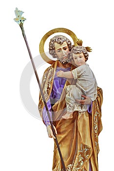 St Joseph holding the Christ child statue isolated