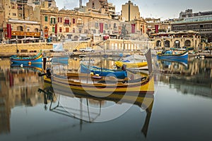 St.Julian`s, Malta - Traditional colorful Luzzu fishing boats