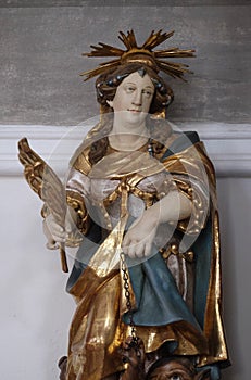 St Juliana, altar statue in the church of St Agatha in Schmerlenbach, Germany