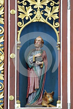 St Luke the Evangelist, statue on the main altar in the parish church of Our Lady of Miracles in Ostarije, Croatia