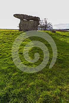 St Lythans Burial Chamber, South Wales. Silhouetted against winter sun